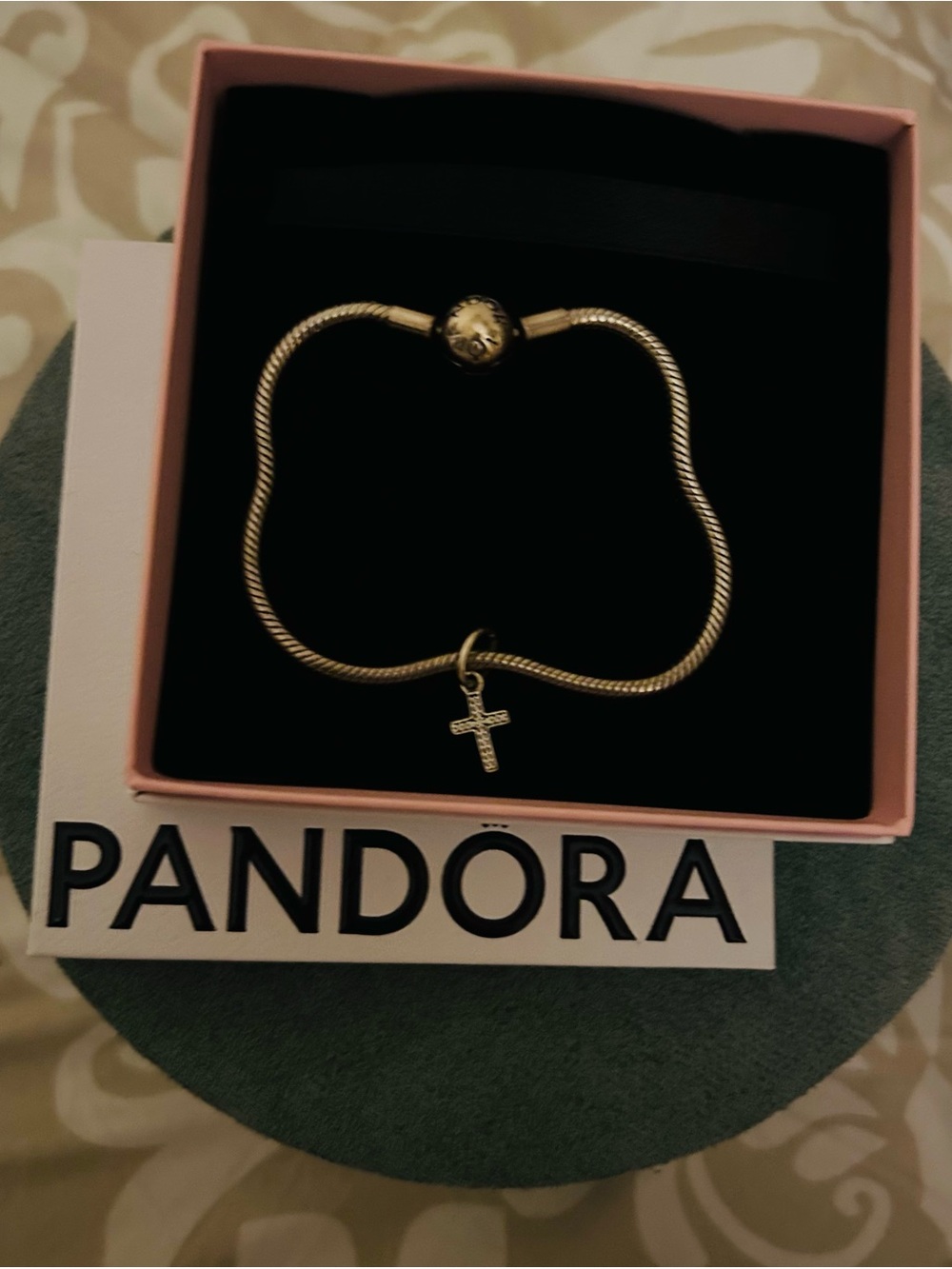 Pandora Snake Chain Bracelet with Cross Dangle needs cleaning